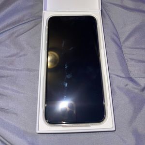 iPhone X  64GB Brand New! Never used still in the box. Silver edges white back.